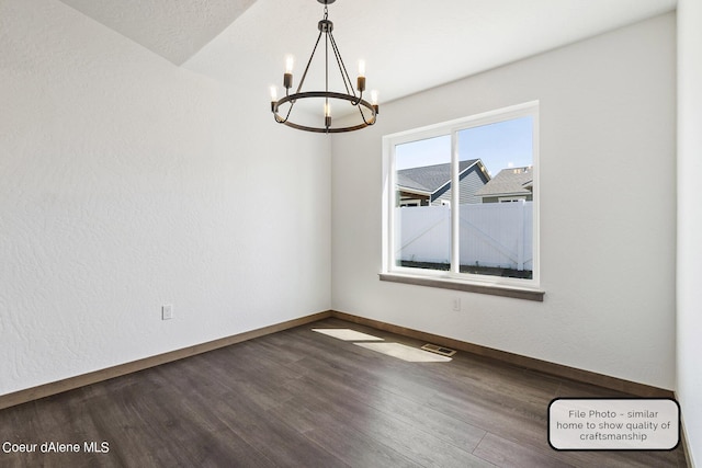 LT6BLK1 E Valley St, Oldtown, ID 83822 - unfurnished room with a chandelier, wood finished floors, and baseboards