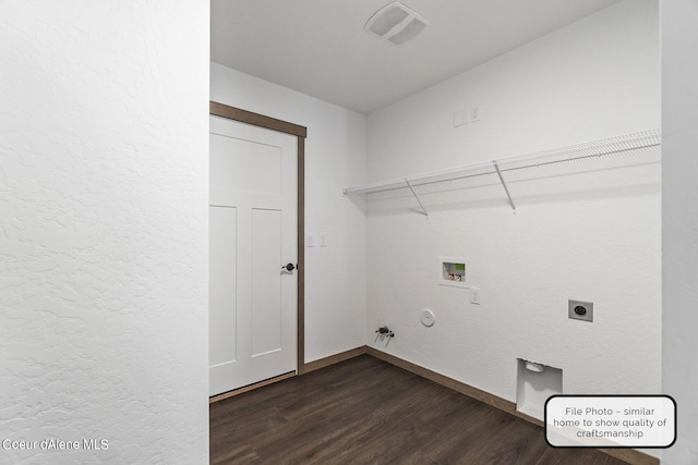 LT6BLK1 E Valley St, Oldtown, ID 83822 - washroom featuring gas dryer hookup, hookup for a washing machine, hookup for an electric dryer, dark wood-type flooring, and baseboards