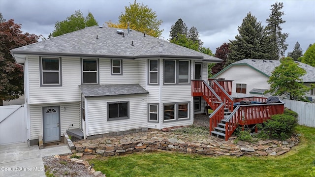 3168 N 9th St, Coeur Dalene, ID 83815 - back of house with a shingled roof, a deck, and stairs