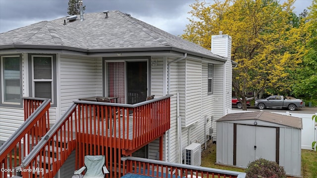3168 N 9th St, Coeur Dalene, ID 83815 - wooden deck with central AC unit