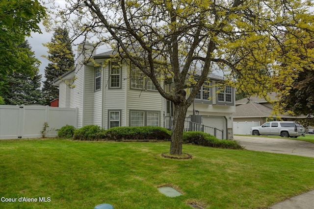 3168 N 9th St, Coeur Dalene, ID 83815 - view of front of home with an attached garage, driveway, and a chimney