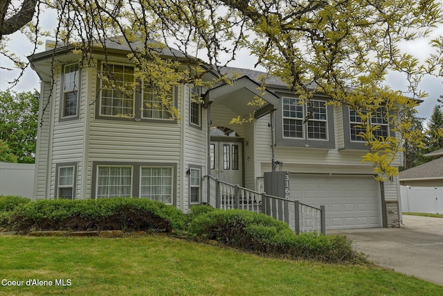 3168 N 9th St, Coeur Dalene, ID 83815 - view of front facade with concrete driveway and an attached garage