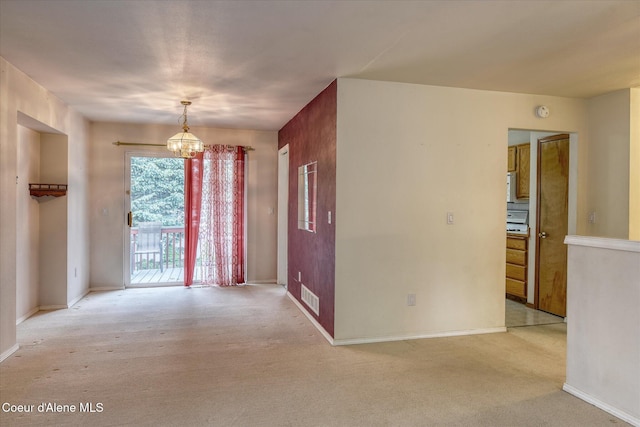 3168 N 9th St, Coeur Dalene, ID 83815 - unfurnished room with a chandelier, light carpet, and baseboards