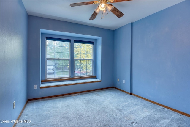 3168 N 9th St, Coeur Dalene, ID 83815 - carpeted spare room featuring baseboards and ceiling fan