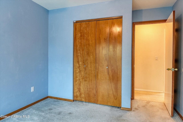 3168 N 9th St, Coeur Dalene, ID 83815 - unfurnished bedroom with carpet, a closet, and baseboards