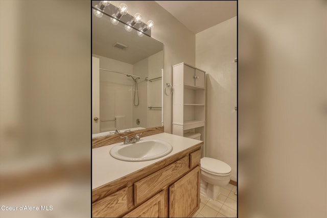 3168 N 9th St, Coeur Dalene, ID 83815 - full bathroom featuring toilet, tile patterned floors, vanity, and a shower