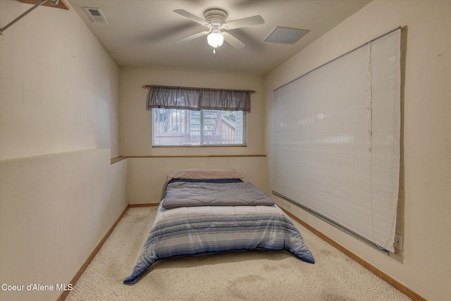 3168 N 9th St, Coeur Dalene, ID 83815 - carpeted bedroom with baseboards and a ceiling fan