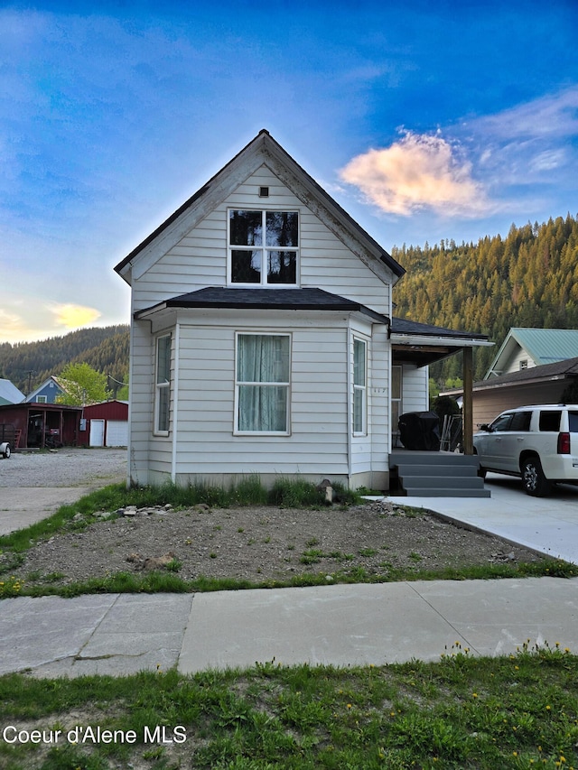 117 River St, Wallace, ID 83873 - view of side of property with a porch