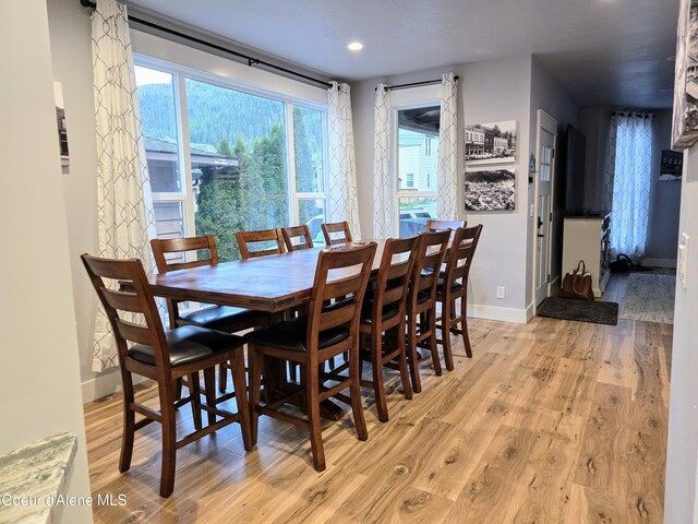 117 River St, Wallace, ID 83873 - dining room featuring light wood-style flooring, baseboards, and recessed lighting