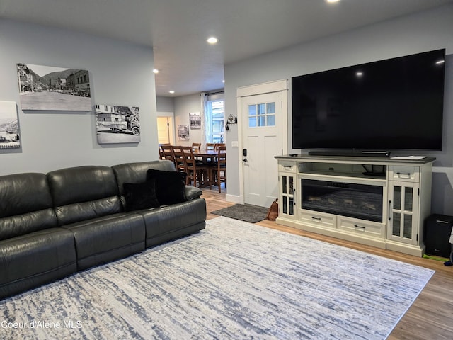 117 River St, Wallace, ID 83873 - living room featuring wood finished floors and recessed lighting