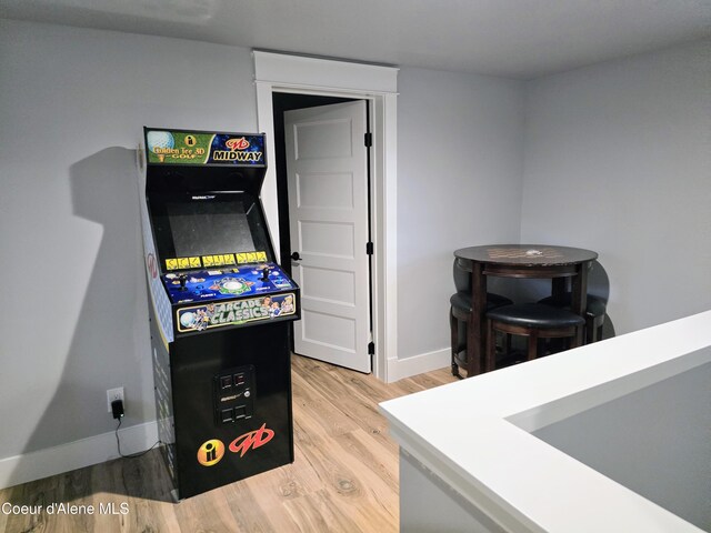 117 River St, Wallace, ID 83873 - rec room with baseboards and wood finished floors