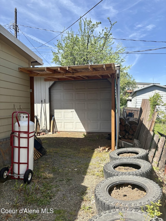 235 S 5th St, Saint Maries, ID 83861 - garage with fence and driveway