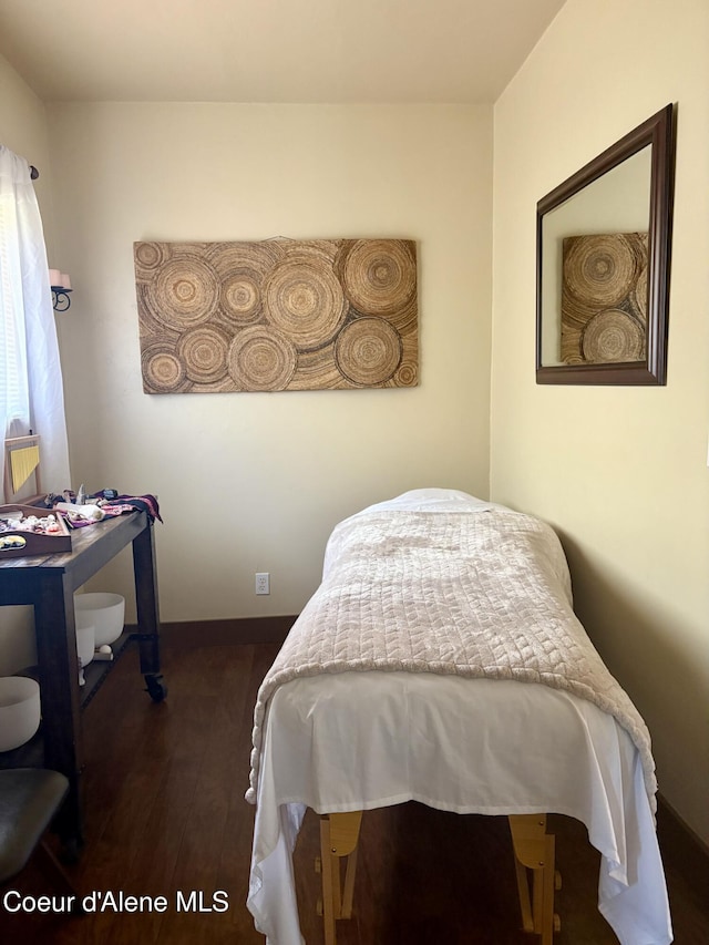 235 S 5th St, Saint Maries, ID 83861 - bedroom featuring dark wood-style floors and baseboards
