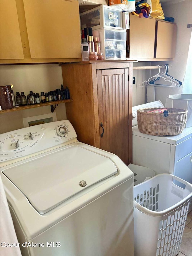235 S 5th St, Saint Maries, ID 83861 - clothes washing area featuring washer hookup and cabinet space