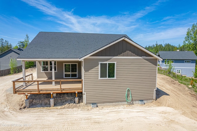 204 Silver Saddle Ct, Pinehurst, ID 83850 - back of property with board and batten siding