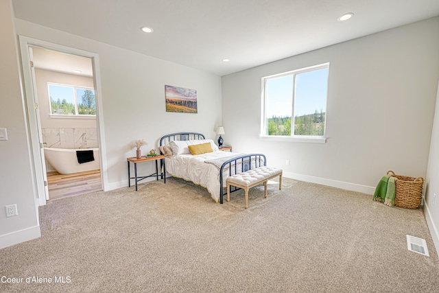 204 Silver Saddle Ct, Pinehurst, ID 83850 - carpeted bedroom featuring recessed lighting, baseboards, and ensuite bath
