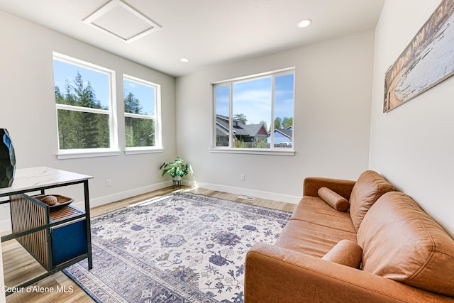 204 Silver Saddle Ct, Pinehurst, ID 83850 - living area with attic access, wood finished floors, baseboards, and recessed lighting