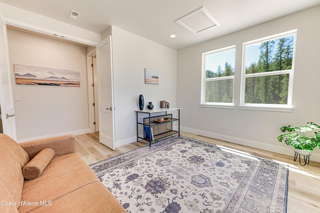 204 Silver Saddle Ct, Pinehurst, ID 83850 - sitting room featuring attic access, wood finished floors, baseboards, and recessed lighting