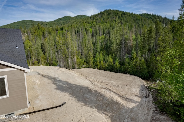204 Silver Saddle Ct, Pinehurst, ID 83850 - mountain view featuring a forest