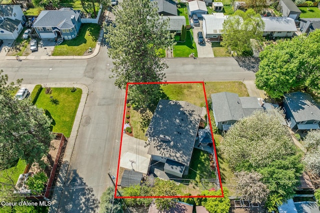 aerial perspective of suburban area with property parcel outlined