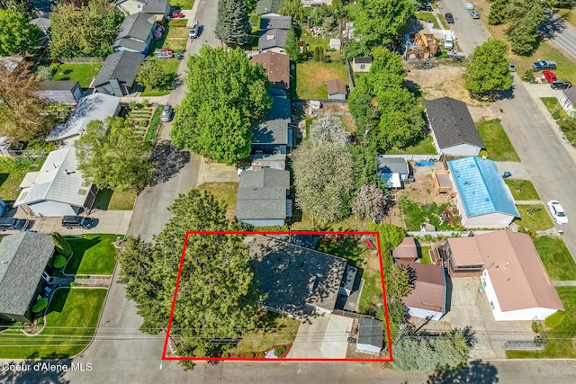 aerial view of residential area with property boundaries highlighted