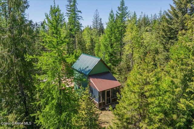1438 Rolling Thunder Ridge Rd, Sandpoint, ID 83864 - view from above of property with a forest