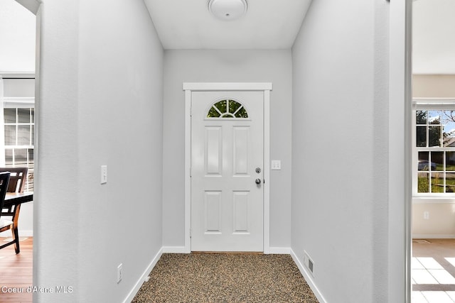 doorway with baseboards