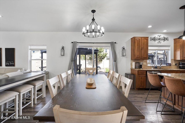 8747 Salmonberry Lp, Hayden, ID 83835 - dining area with a chandelier, healthy amount of natural light, dark wood-type flooring, and recessed lighting