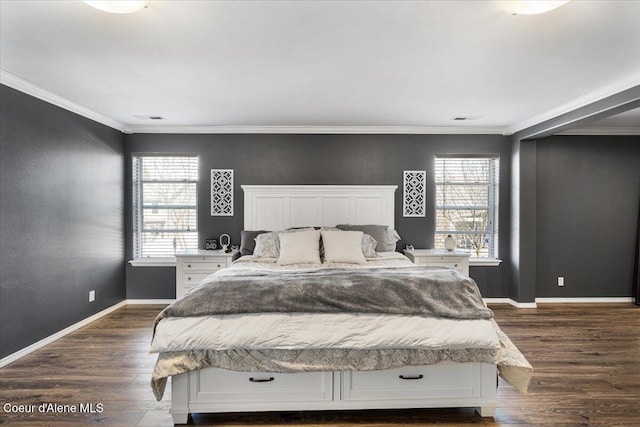 8747 Salmonberry Lp, Hayden, ID 83835 - bedroom featuring crown molding, dark wood-style floors, and baseboards
