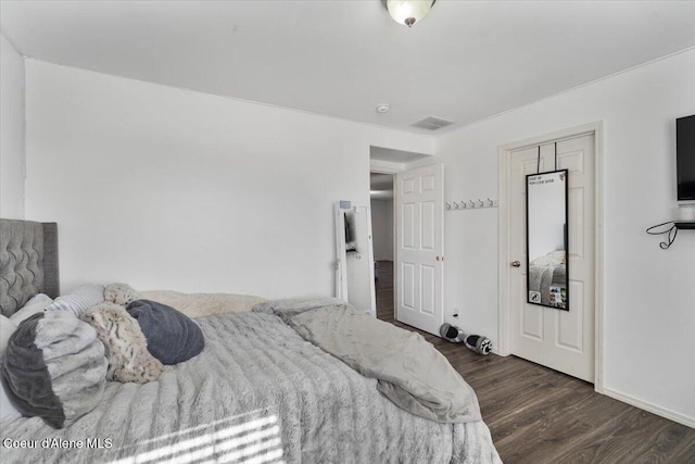 8747 Salmonberry Lp, Hayden, ID 83835 - bedroom with wood finished floors and baseboards