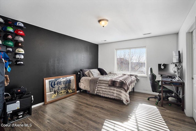 8747 Salmonberry Lp, Hayden, ID 83835 - bedroom featuring a desk, wood finished floors, and baseboards