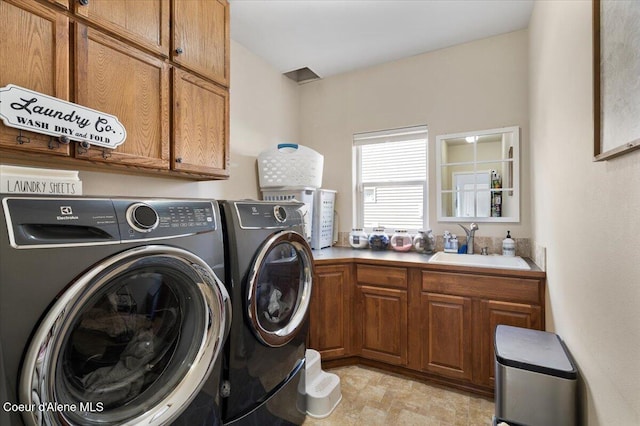 8747 Salmonberry Lp, Hayden, ID 83835 - laundry area with separate washer and dryer and cabinet space