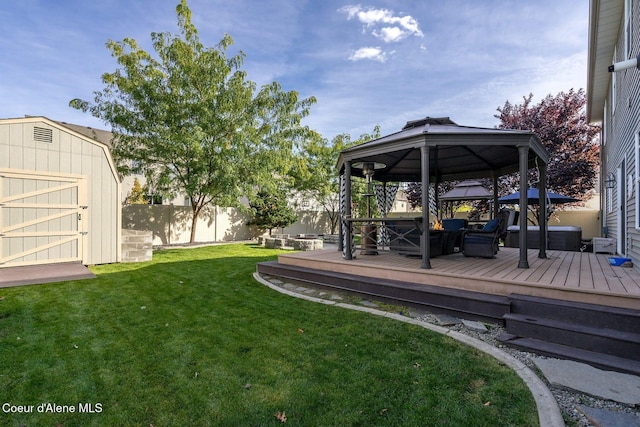 8747 Salmonberry Lp, Hayden, ID 83835 - view of yard with a gazebo, a storage unit, an outdoor structure, and a wooden deck