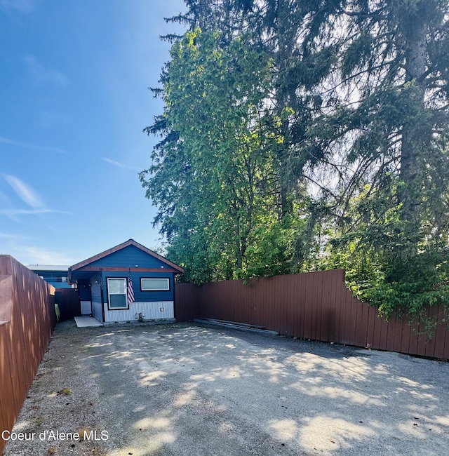 1203 Chestnut St, Sandpoint, ID 83864 - view of home's exterior with fence