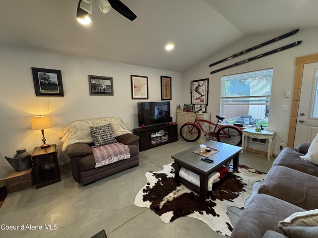 1203 Chestnut St, Sandpoint, ID 83864 - living room with vaulted ceiling, ceiling fan, and light carpet