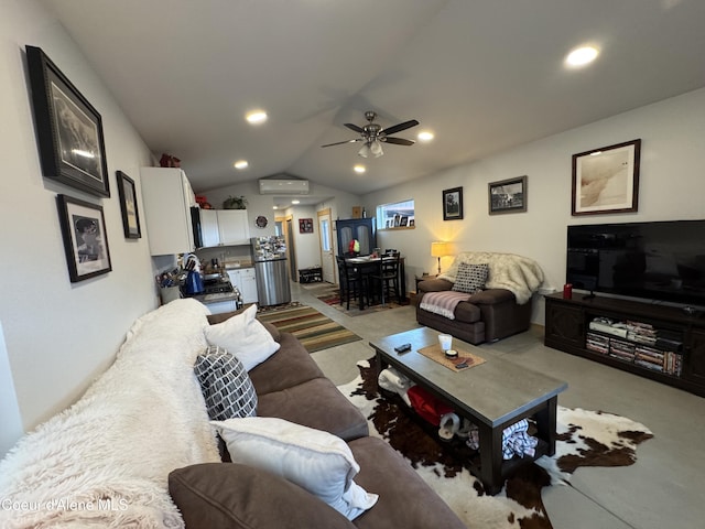 1203 Chestnut St, Sandpoint, ID 83864 - living room featuring a ceiling fan, carpet floors, lofted ceiling, a wall mounted air conditioner, and recessed lighting