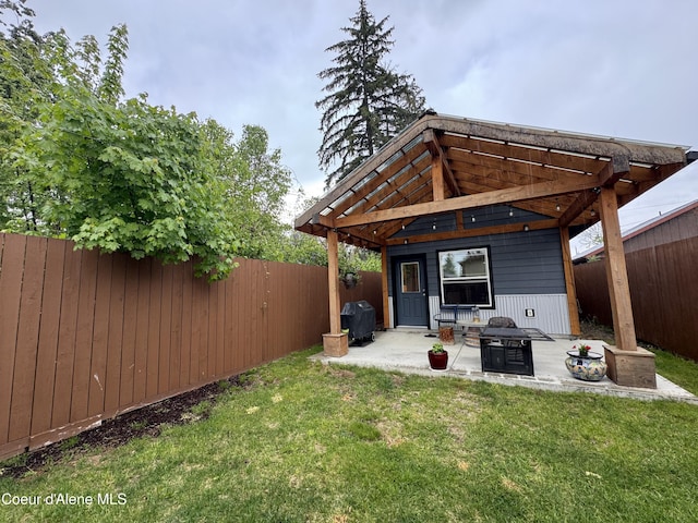1203 Chestnut St, Sandpoint, ID 83864 - view of yard featuring a patio area