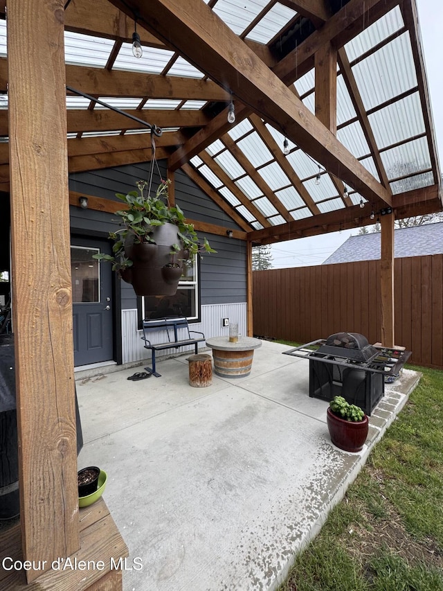 1203 Chestnut St, Sandpoint, ID 83864 - view of patio / terrace featuring fence and a pergola