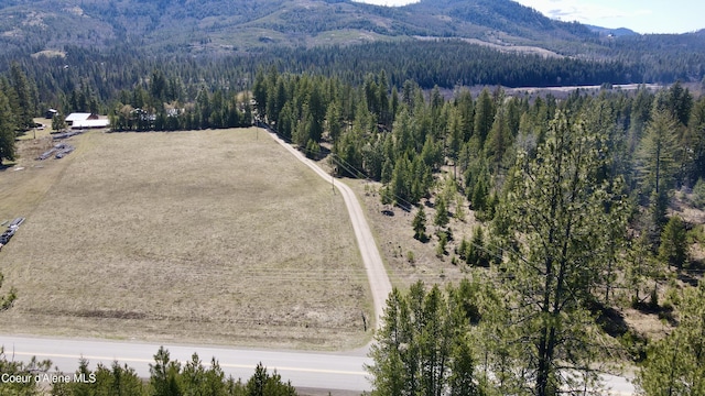 3216 Dufort Rd, Sagle, ID 83860 - aerial view of a forest and a mountainous background