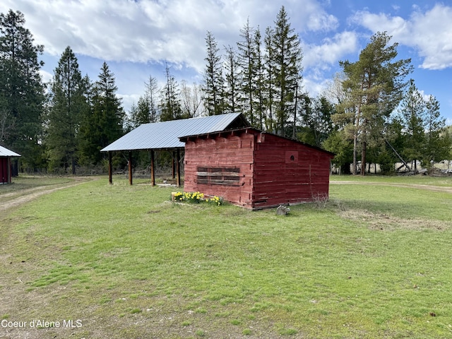 3216 Dufort Rd, Sagle, ID 83860 - view of outdoor structure with view of wooded area