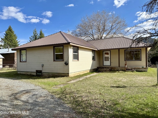 3216 Dufort Rd, Sagle, ID 83860 - back of property with metal roof and a yard