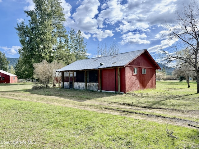3216 Dufort Rd, Sagle, ID 83860 - view of pole building with a lawn
