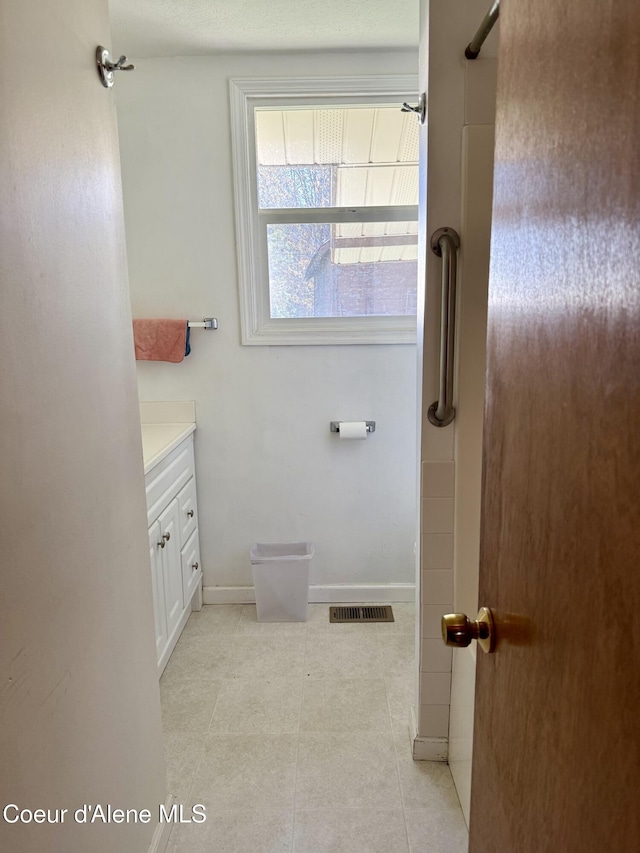 3216 Dufort Rd, Sagle, ID 83860 - bathroom featuring vanity and baseboards