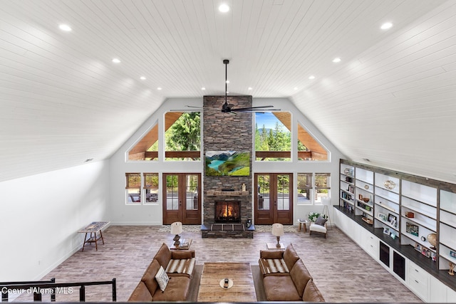 living room featuring wood finished floors, lofted ceiling, recessed lighting, wooden ceiling, and a fireplace