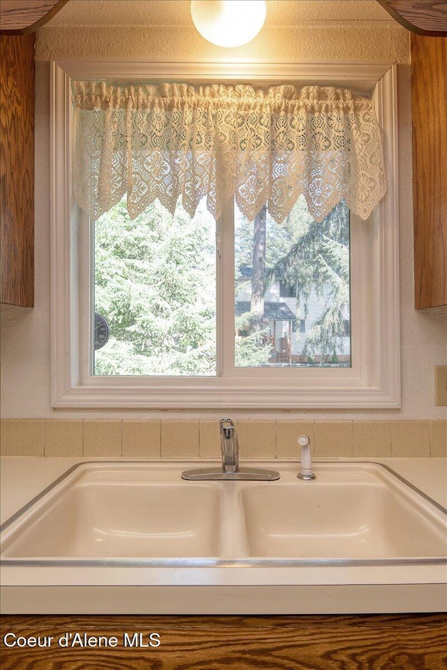 full bath featuring a sink