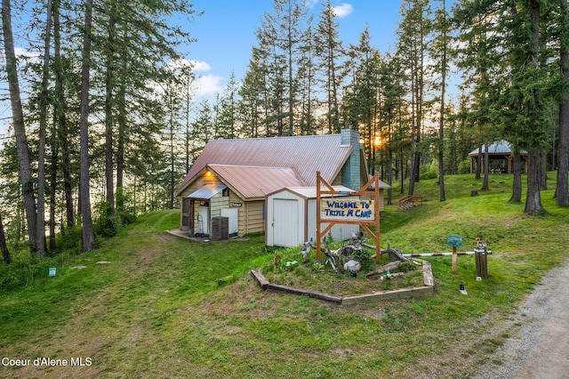 8072 W Radmer Rd, Rathdrum, ID 83858 - view of shed featuring a gazebo and a vegetable garden