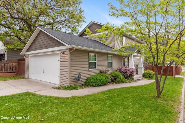 1201 E Locust Ave, Coeur Dalene, ID 83814 - view of front facade featuring a shingled roof, driveway, and a garage