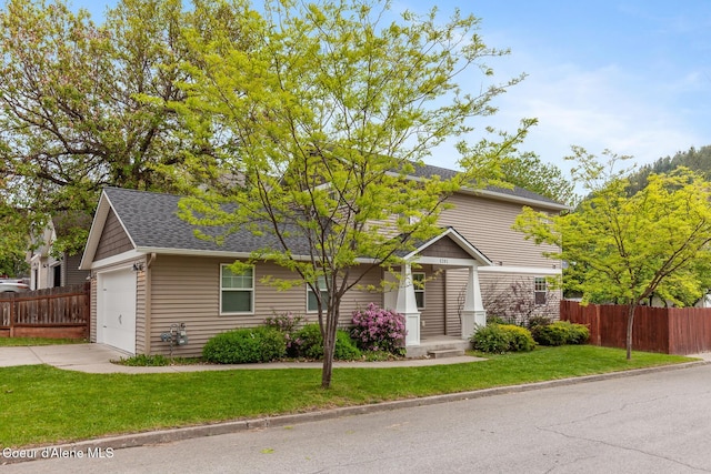 1201 E Locust Ave, Coeur Dalene, ID 83814 - view of front facade featuring driveway, an attached garage, and roof with shingles