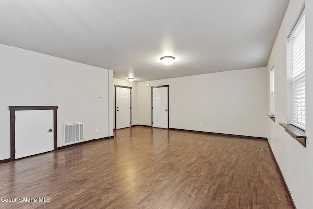 1201 E Locust Ave, Coeur Dalene, ID 83814 - unfurnished room featuring wood finished floors and baseboards