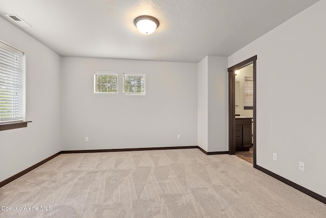 1201 E Locust Ave, Coeur Dalene, ID 83814 - carpeted spare room with baseboards